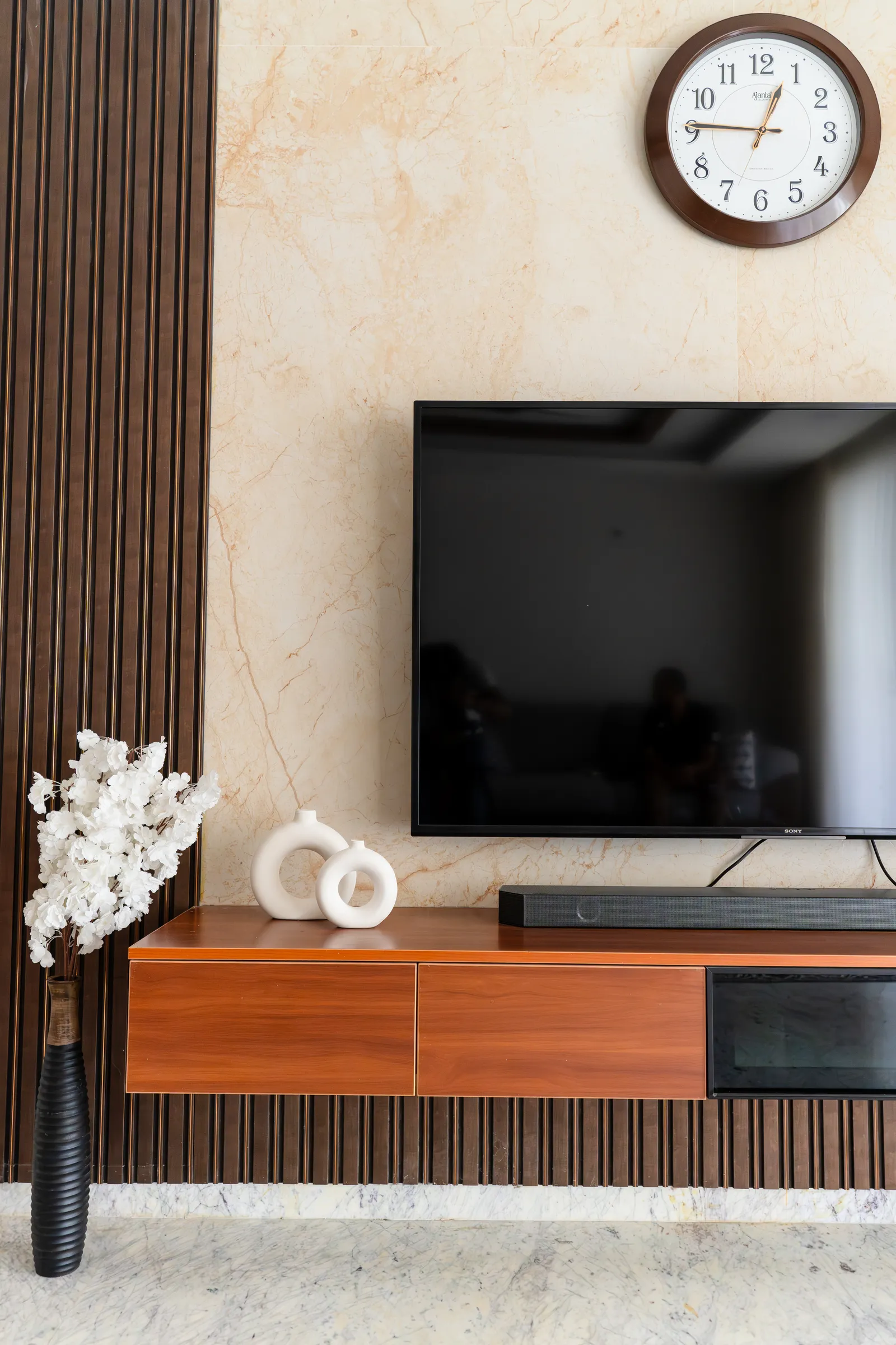 TV unit with fluted panel and teak console — Karthik's Residence